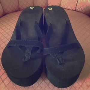 Black wedge flip flops worn once